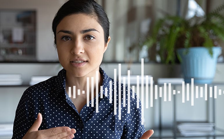 A woman using voice AI