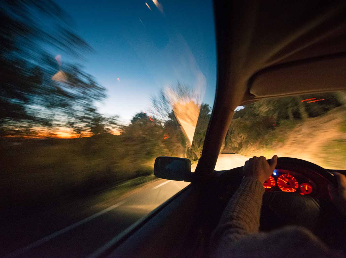 a man driving a voice-enabled car