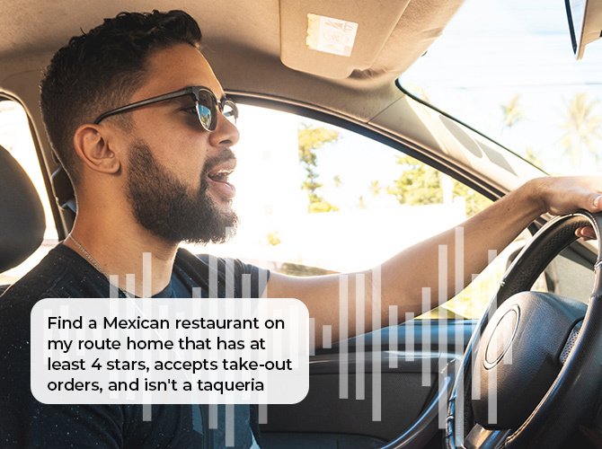 a man talking to his car with voice AI
