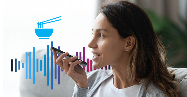 woman placing a mobile order with her voice
