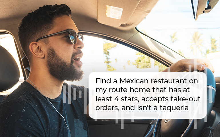 man driving and talking to his car