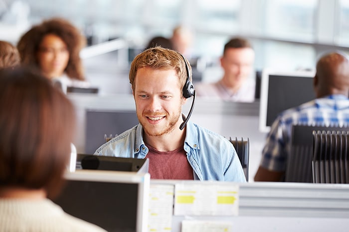 a man wearing a voice-enabled headset